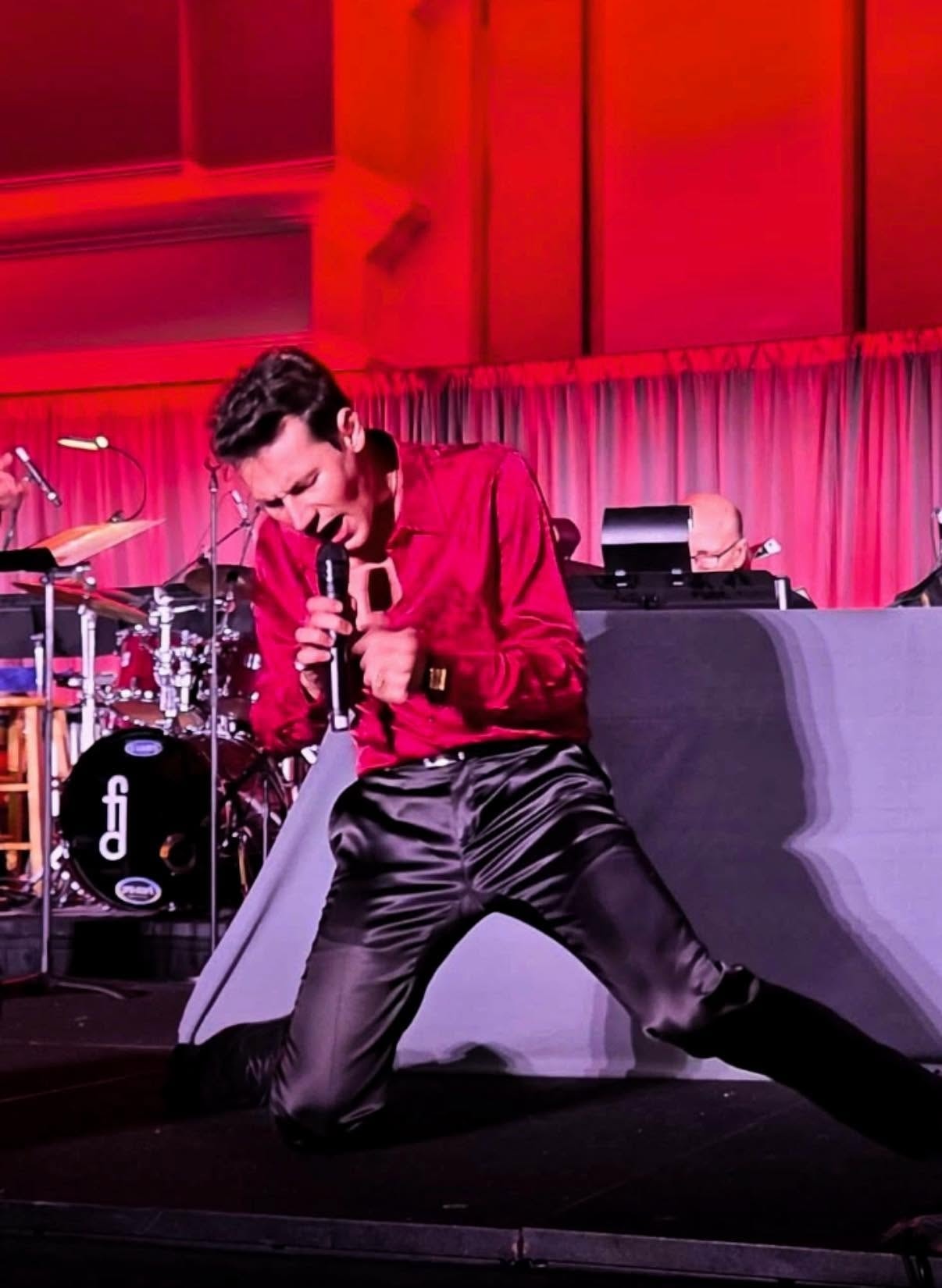 Peter with the ten-piece orchestra